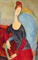 Mme Hebuterne In A Blue Chair by Amedeo Modigliani