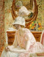 Young Girl Before a Mirror in a Pink Dress by Frederick Carl Frieseke