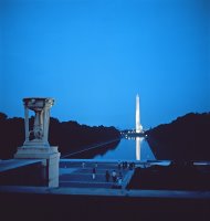 Night view of the Washington Monument across the National Mall by American School